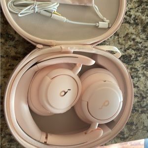 Pink soundcore Bluetooth headphones